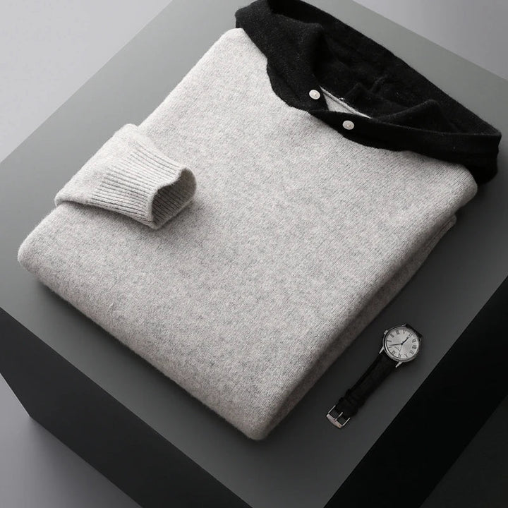 Man wearing a lightweight men's pullover hoodie. Perfect versatile layering piece for warmth & comfort.