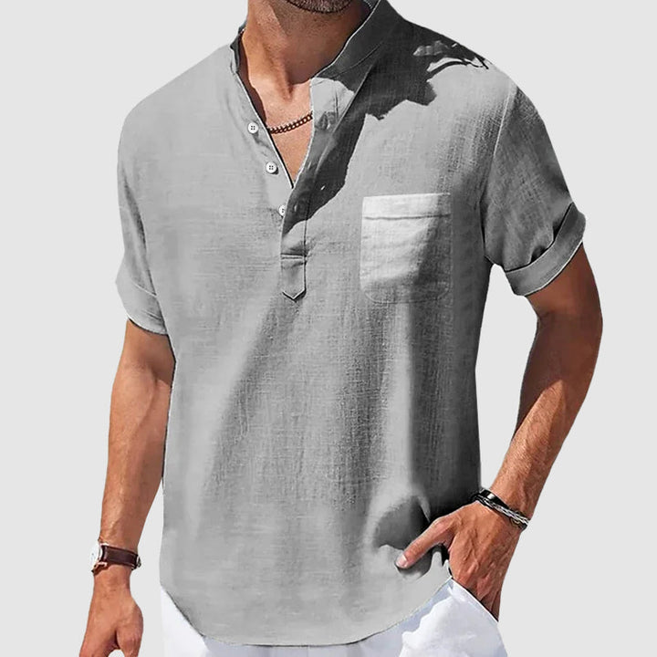 Gray men's lightweight henley shirt. Comfortable, short sleeve, relaxed fit for everyday casual fashion.