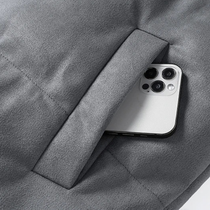 Back view of a men's lightweight puffer jacket, showcasing sleek design, perfect for casual fall & winter warmth.