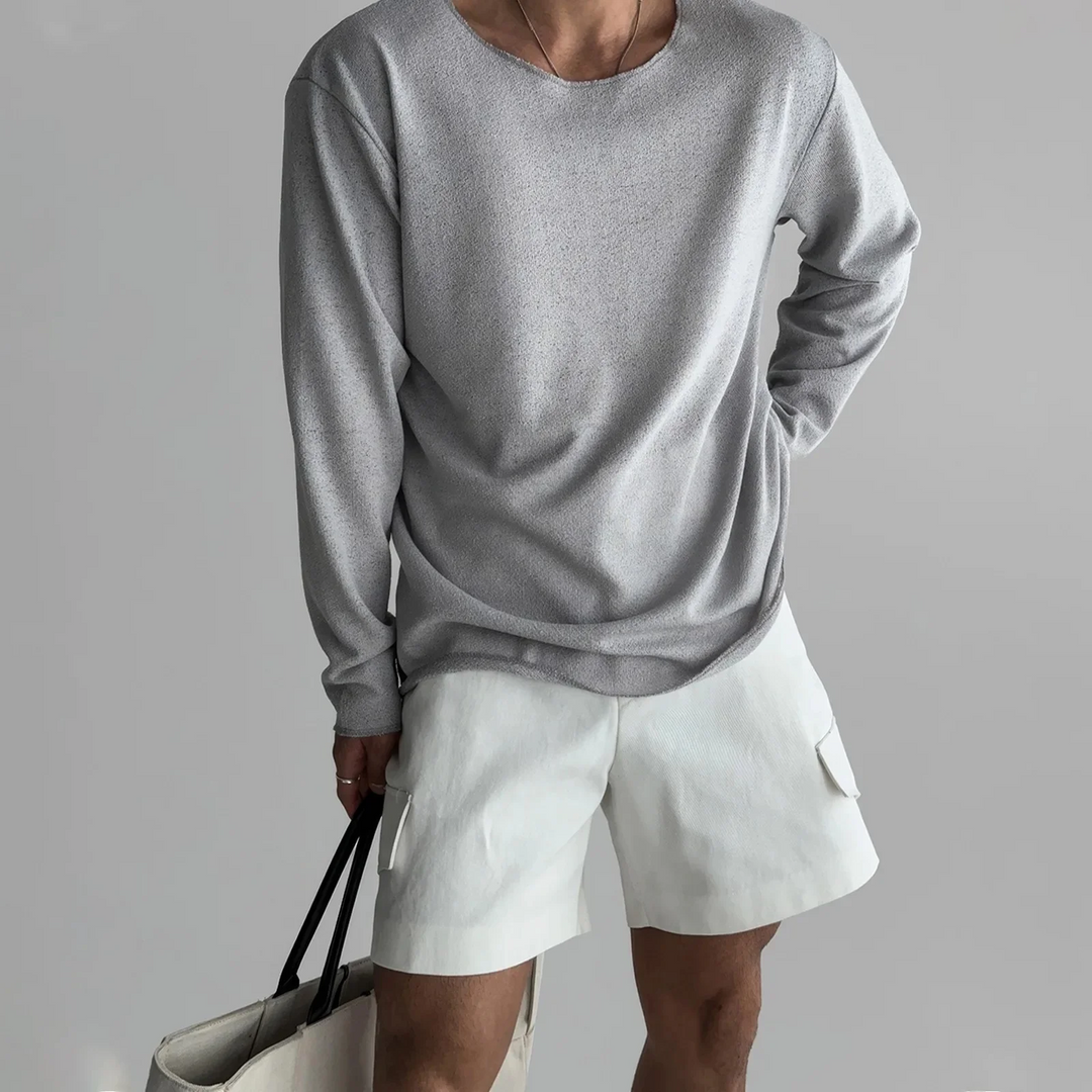 Stylish men's lightweight long-sleeve pullover featuring a relaxed fit and modern drop shoulder design.