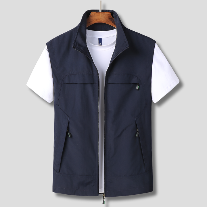 Men's lightweight quick-dry outdoor zip vest. Ideal for travel, hiking, and active wear. Breathable utility design.