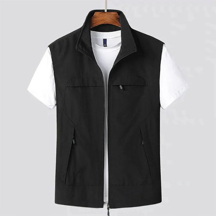 Versatile men's outdoor vest with quick-dry fabric. Lightweight zip design for travel, active wear, and utility.