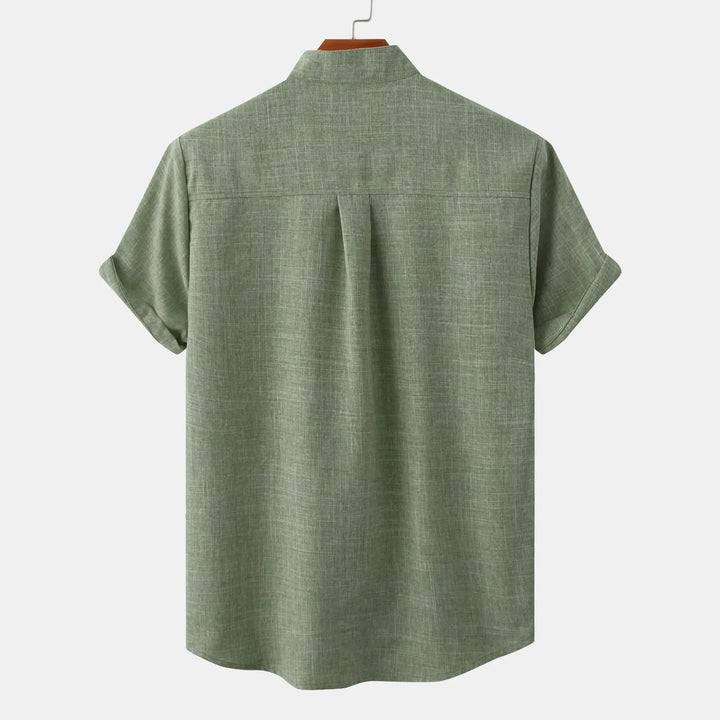 Comfortable men's short-sleeve button-up for lightweight summer wear, ideal for warm weather.