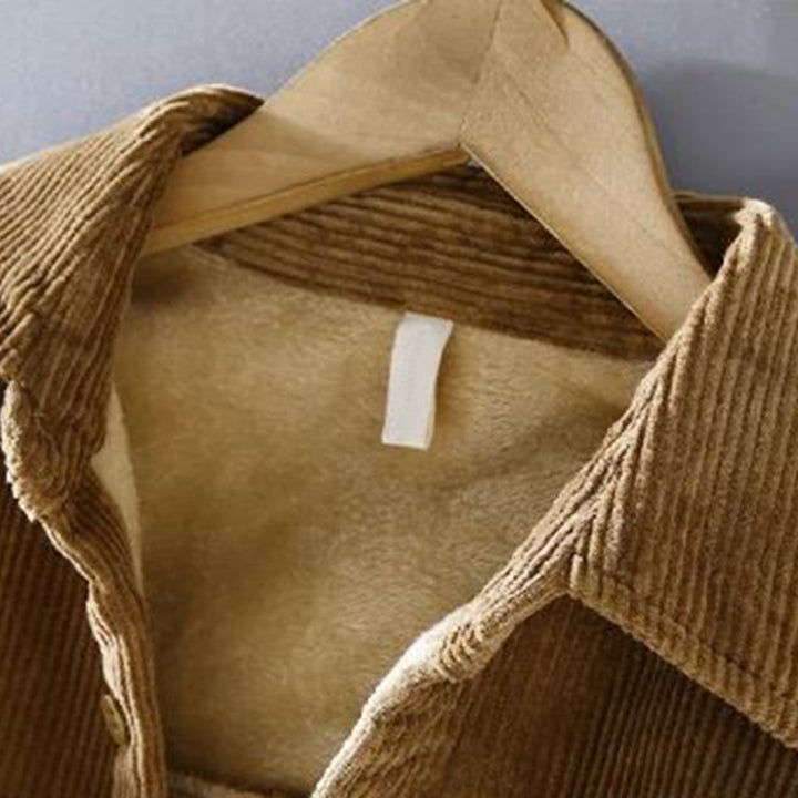 Stylish man wearing a warm men's lined corduroy jacket, showcasing versatile autumn casual wear.
