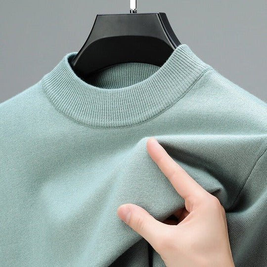 Versatile men's mock neck pullover sweater for fall fashion, offering comfort and modern style.