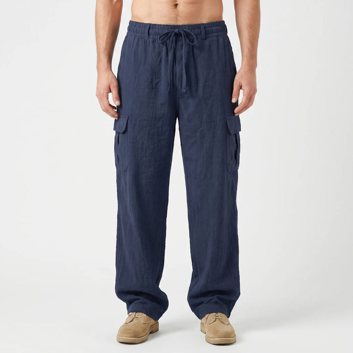 Men's loose fit cargo pants featuring practical utility pockets, great for travel and outdoor activities.
