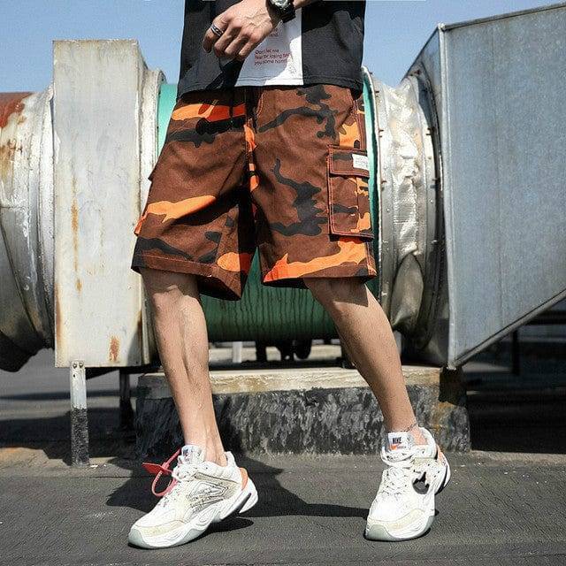 Casual men's cotton shorts with multiple pockets, drawstring closure, and relaxed fit.