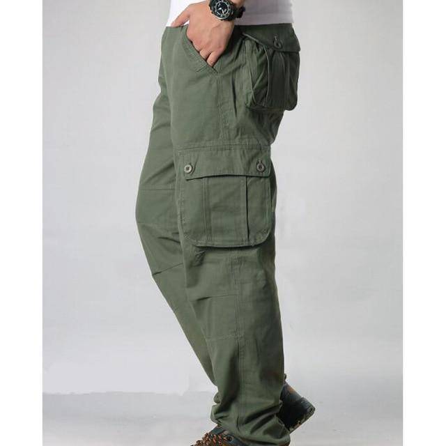 Rugged men's loose fit cargo pants, tactical multi-pocket design, durable cotton for work & outdoors.