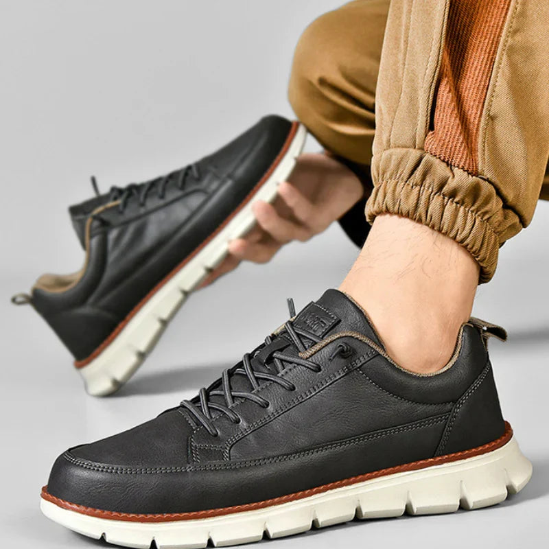 Close-up of the lace-up system on Lucca modern men's sneakers, ensuring a secure and comfortable fit.