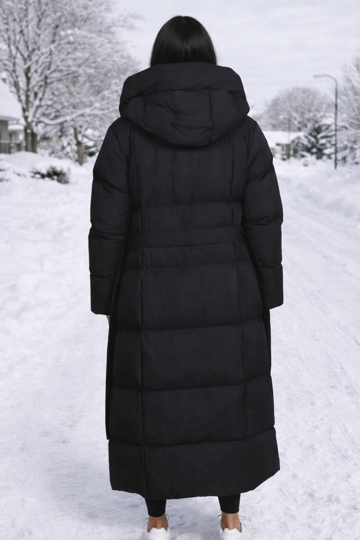 Stylish men's longline puffer jacket, hooded and insulated for superior winter warmth and outerwear comfort.