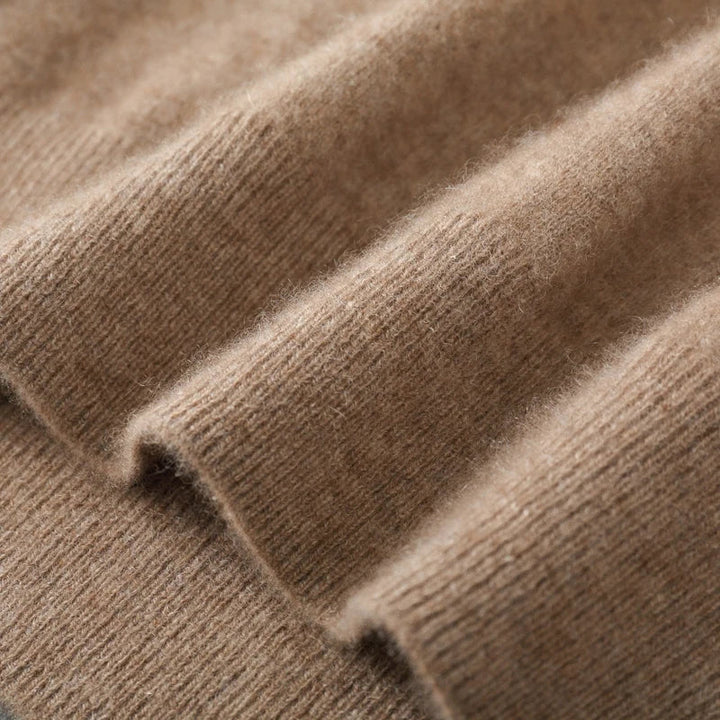 Close-up of V-neckline on a fine cashmere men's vest, showcasing quality and design.