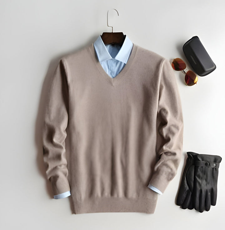 Modern men's luxury V-neck cashmere pullover, elegant long sleeve sweater for versatile fall and winter fashion.
