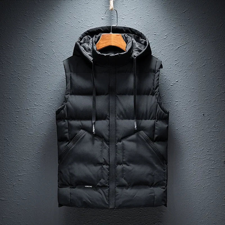 Midtown Men's Hooded Puffer Vest. A comfortable, weather-ready layering piece, great for men's casual winter wear.
