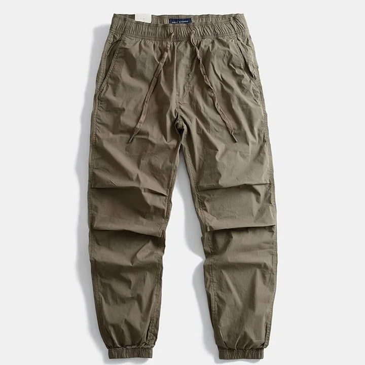 Khaki Men's Milo utility pants for versatile style, comfort & functionality. Perfect for travel & casual wear.