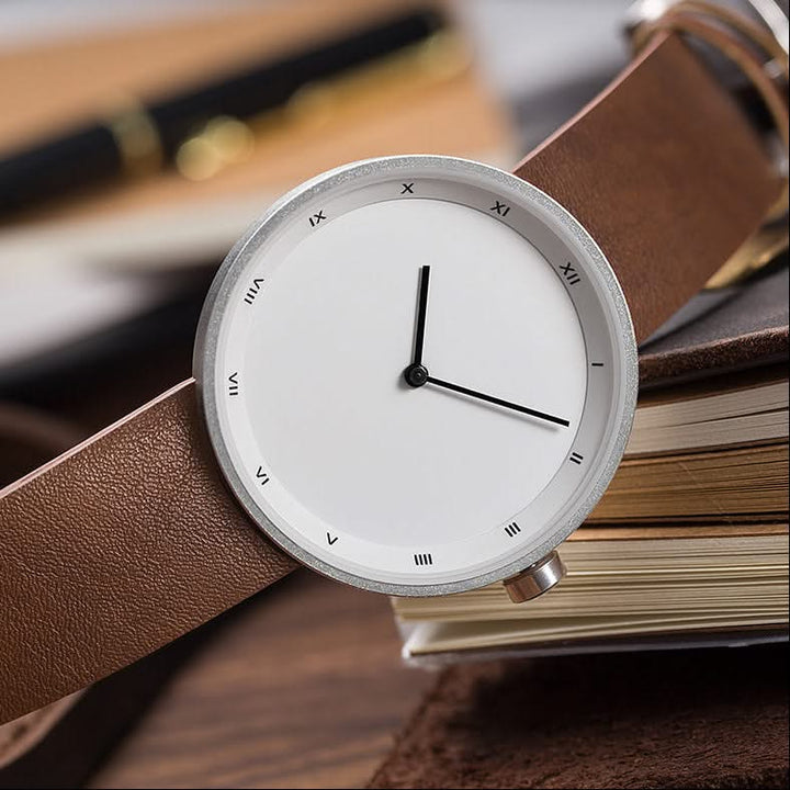 Elegant men's minimalist wrist watch, a sleek modern fashion accessory for him.