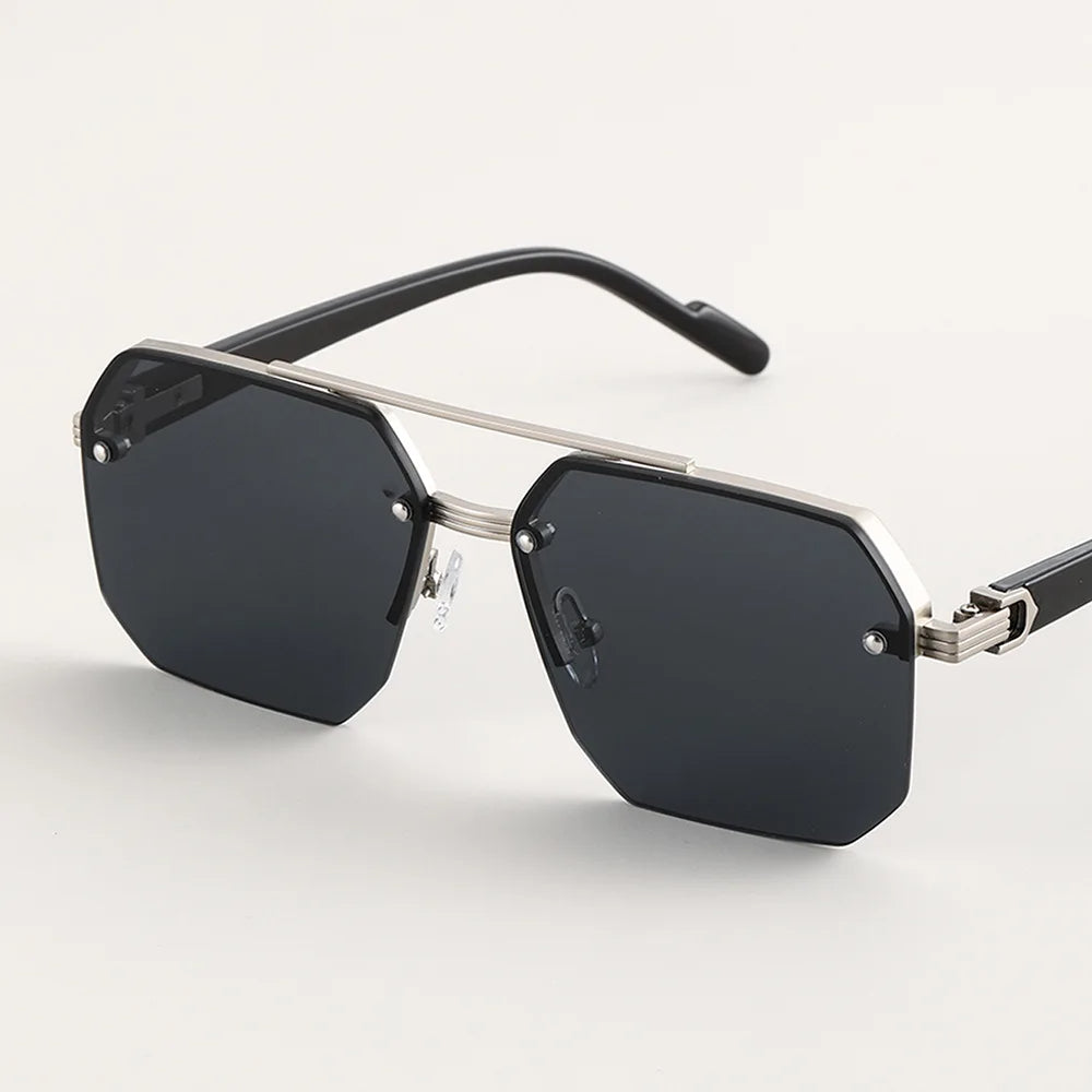 Sapphire blue men's geometric sunglasses with UV protection. Modern, lightweight frames & polarized lenses.