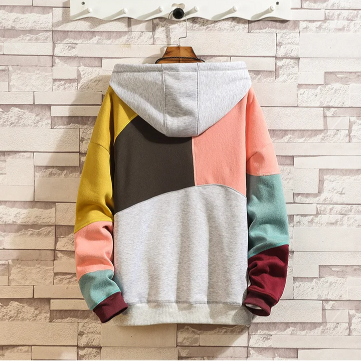 Comfortable men's patchwork pullover hoodie. Features a unique, modern design, perfect for casual fashion & streetwear.