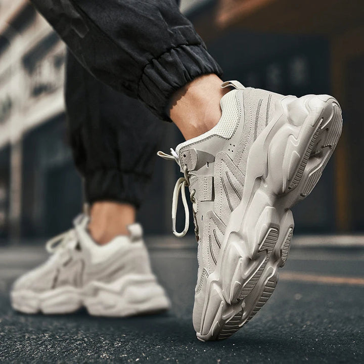 Durable men's chunky platform sneakers, athletic-inspired streetwear footwear.