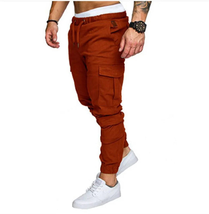 Texture close-up of men's cargo pants, detail of stitching on pockets