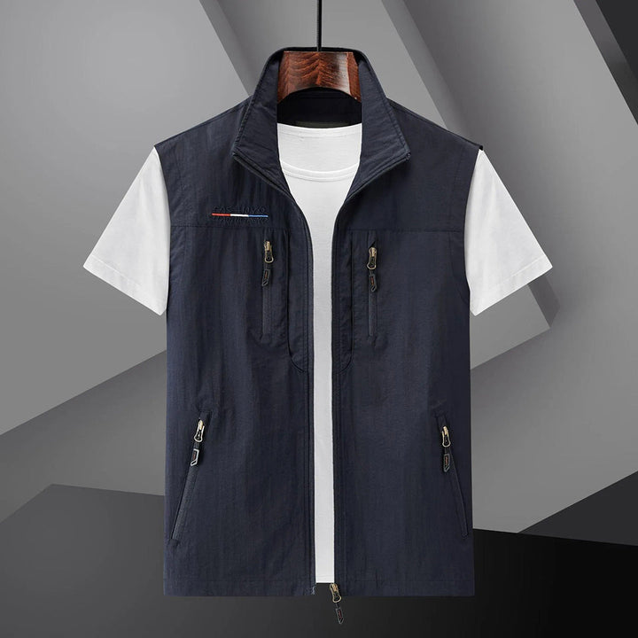 Men's multi-pocket outdoor utility vest for fishing, hiking & travel. Lightweight adventure gear.