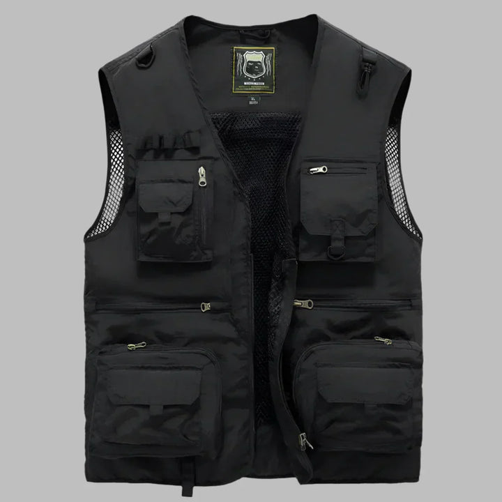 Tan men's multi-pocket fishing vest for fly fishing, photography, and outdoor adventure. Ample storage.