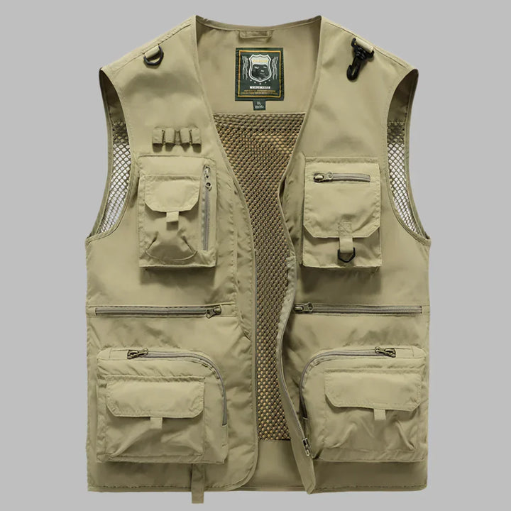 Practical men's travel vest with multiple pockets for gear, tools, and essentials. Ideal for adventurers.