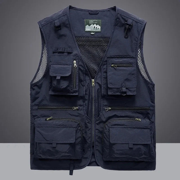 Men's multi-pocket utility vest, ideal for tools & work. Durable, breathable storage for essentials.