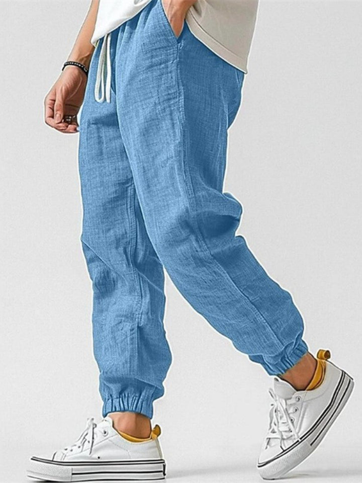 Lightweight men's Nomad linen blend joggers with a comfortable relaxed & tapered fit.