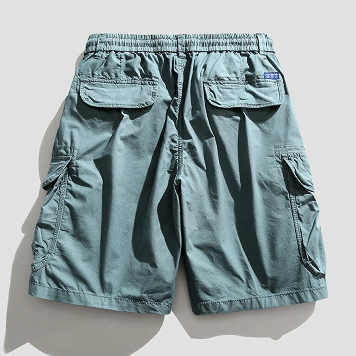 Rugged yet comfortable men's cargo shorts, deep pockets for utility, casual & outdoor summer wear.