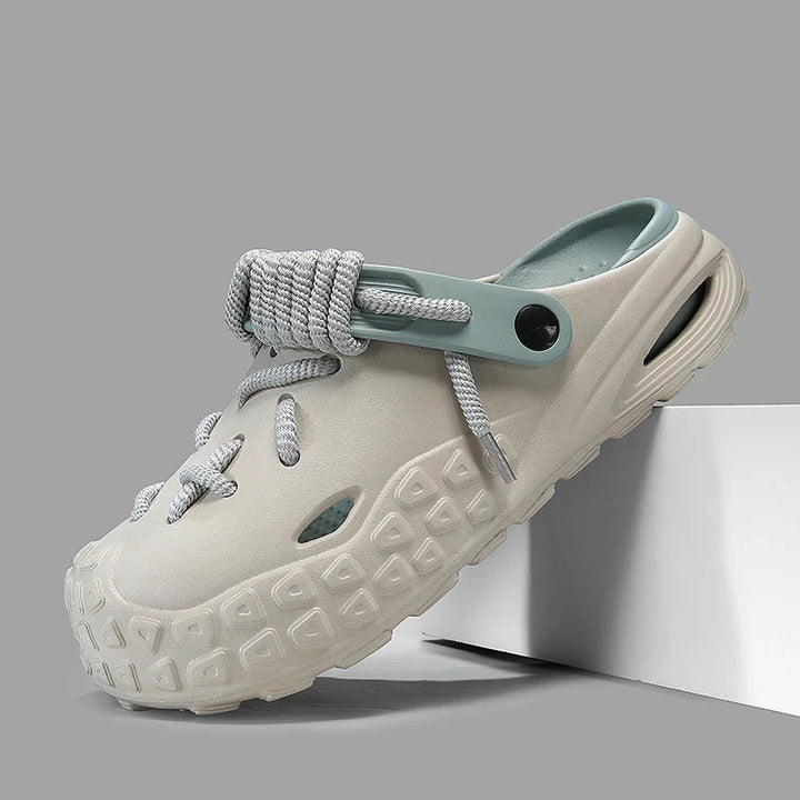 Men's casual footwear: Odyssey Laced Clogs, offering personalized comfort & style.