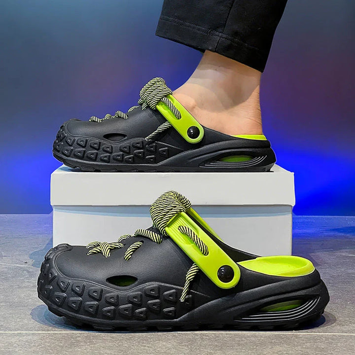 Men's Odyssey Laced Clogs, water-friendly, breathable, and adjustable for comfort.
