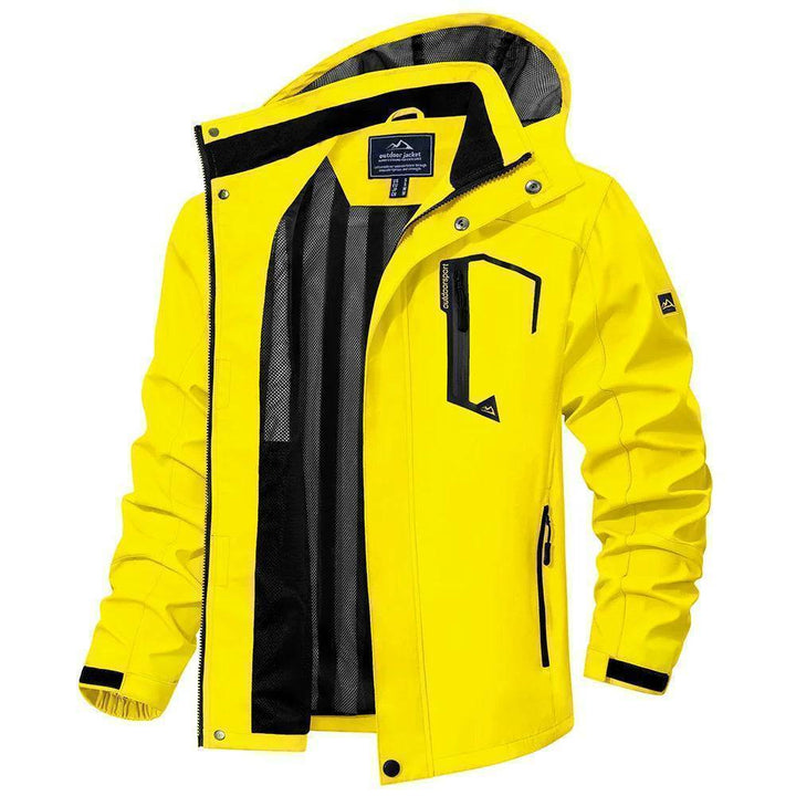 Men's waterproof jacket in red with detachable hood, demonstrating windproof features outdoors.