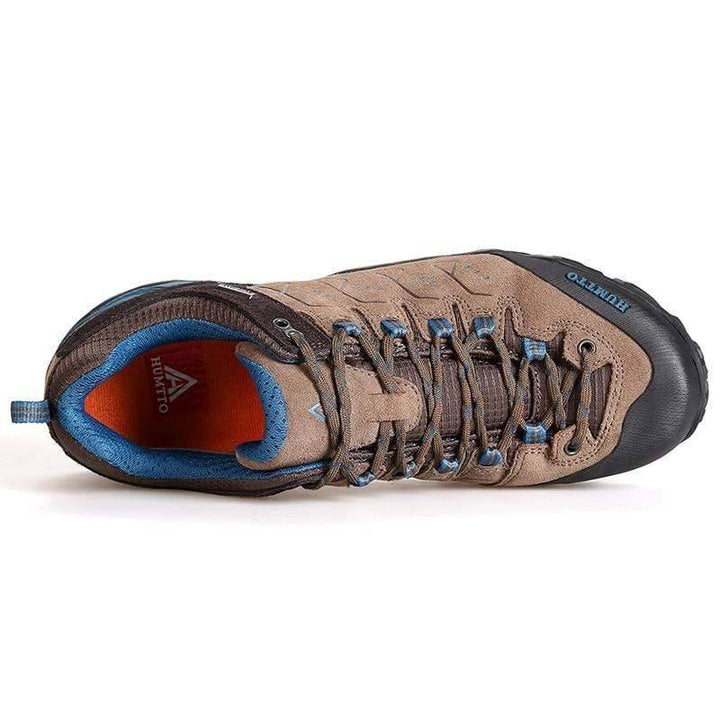 Durable men's trekking boots, ideal for camping and outdoor adventures, with non-slip sole