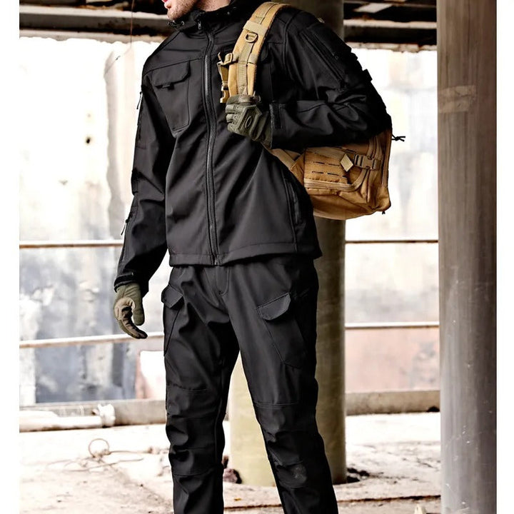 Durable men's multi-pocket performance set for hiking and camping. Includes outdoor hoodie and pants.