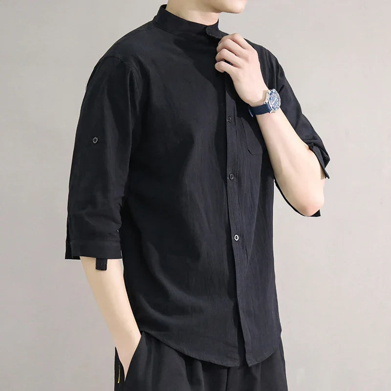 Modern men's fashion: oversized collared half-sleeve shirt for comfortable warm weather style.