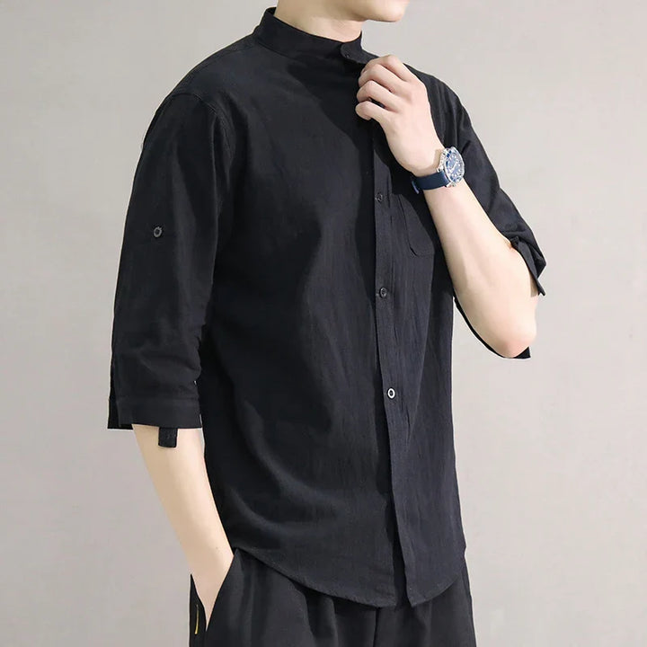 Modern men's fashion: oversized collared half-sleeve shirt for comfortable warm weather style.