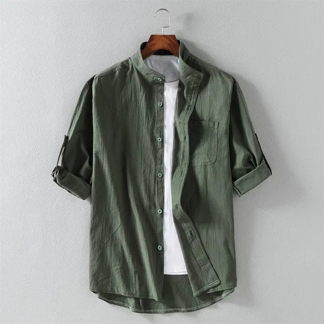 Spring/summer men's oversized half-sleeve collared shirt, great for warm casual fashion.