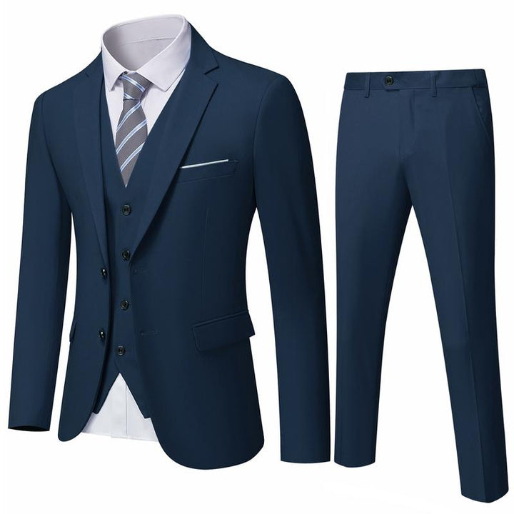 Tailored men's three-piece suit, sharp & sophisticated. Perfect for professional business attire.