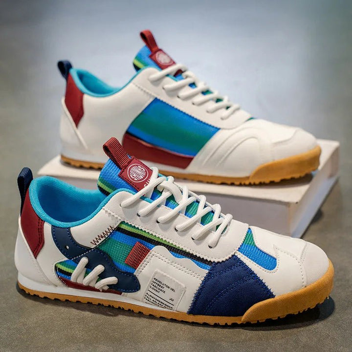 Front view of men's durable utility sneakers. Stylish patchwork design for urban fashion, trail, & active comfort.