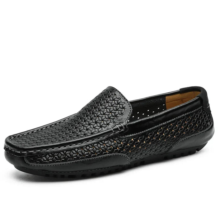 Modern men's perforated slip-on loafers, a stylish choice for contemporary casual men's fashion.
