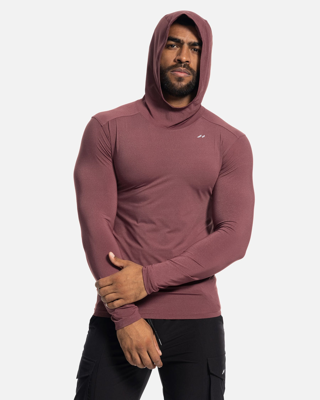 Lightweight men's baselayer hoodie, ideal layering piece for active comfort in varying temperatures.