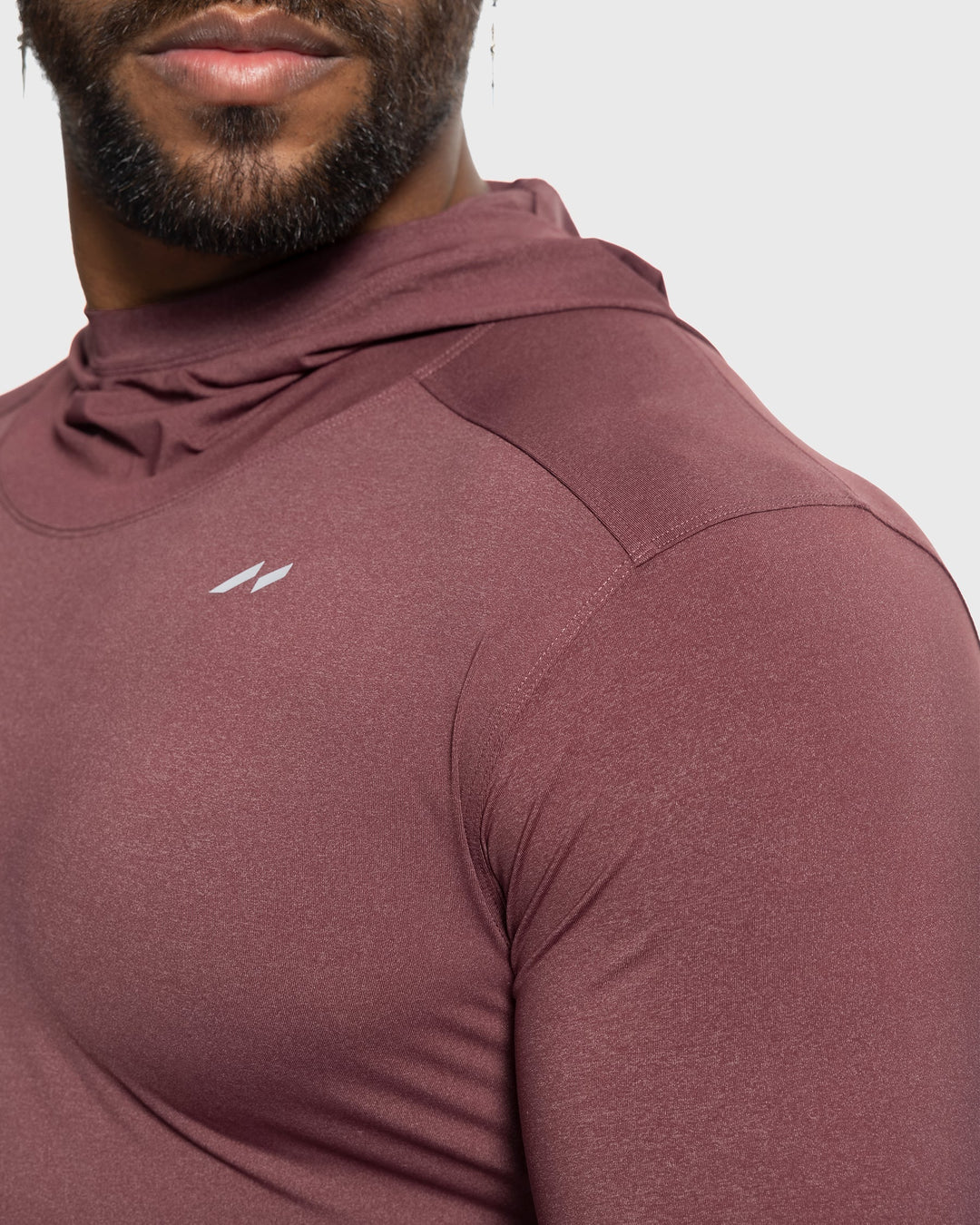 Men's active performance baselayer hoodie, stretch fit & moisture-wicking for all activities.