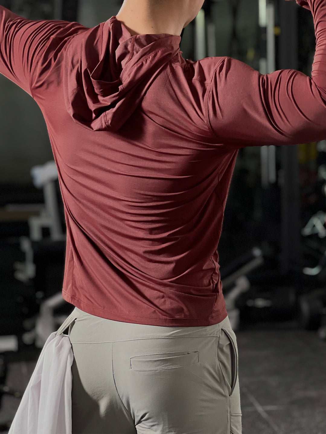 Men's workout gear baselayer hoodie, providing active comfort and performance for intense training.