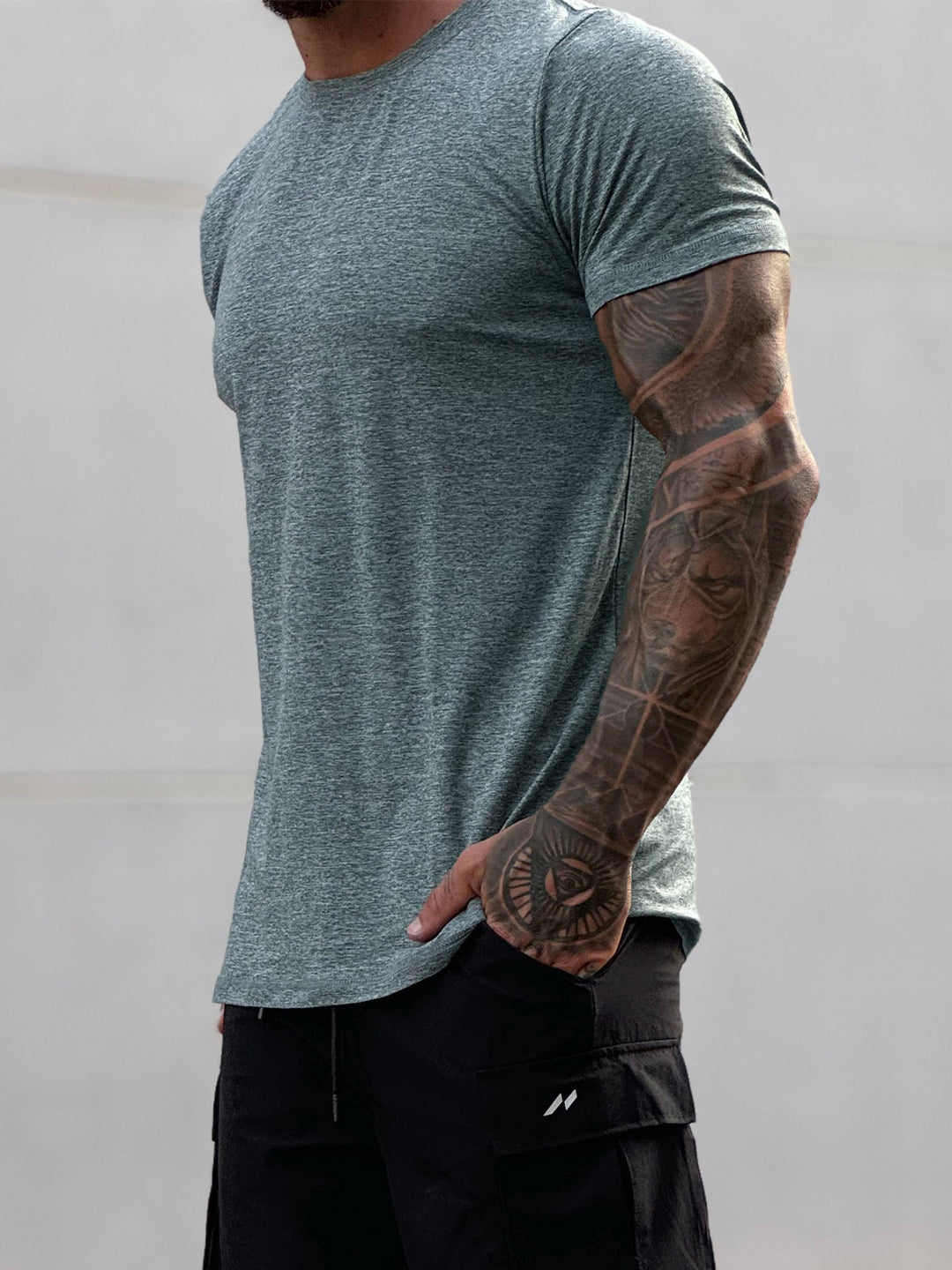 Breathable men's athletic top, modern fit for all-day comfort.