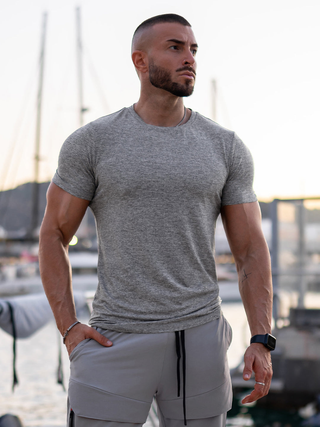 Men's performance tee, moisture-wicking for active comfort & style.