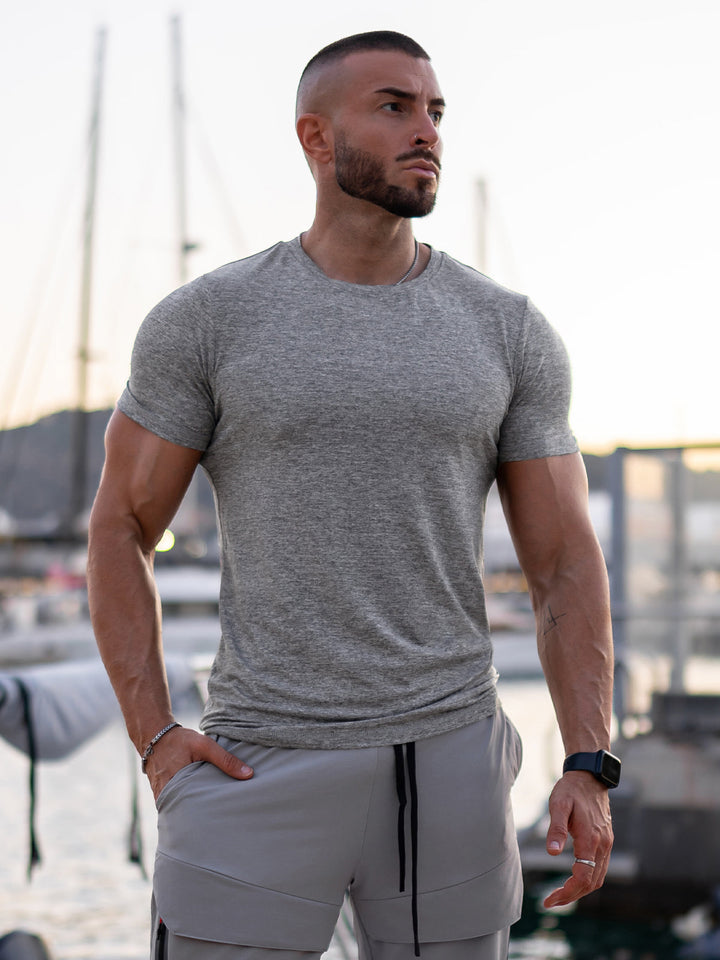 Men's performance tee, moisture-wicking for active comfort & style.