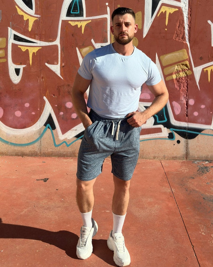 Men's gym performance tee, moisture-wicking, ideal for intense workouts.