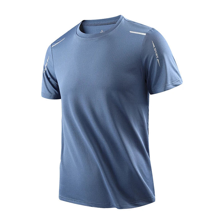Dynamic shot of a runner wearing a Men's Velocity Tech Tee, highlighting sweat-wicking activewear performance.
