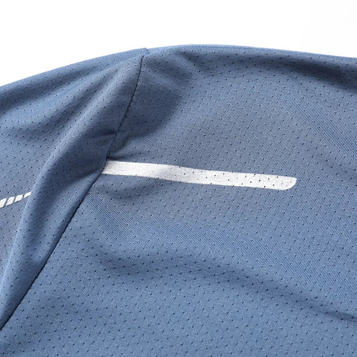 Athletic man in a Velocity Tech Tee, showcasing performance activewear for workout and training sessions.