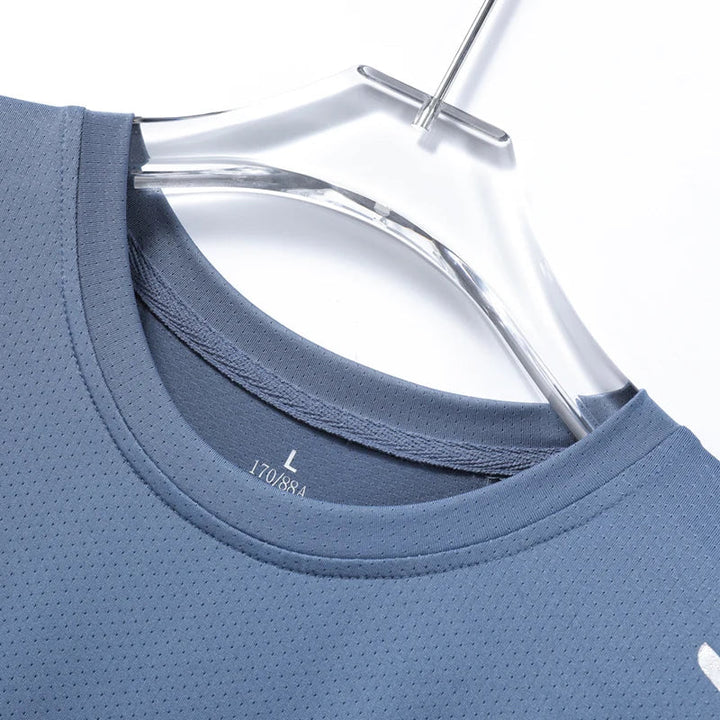 Lightweight Men's Performance Tech Tee. Essential sweat-wicking shirt for activewear, running, & gym.